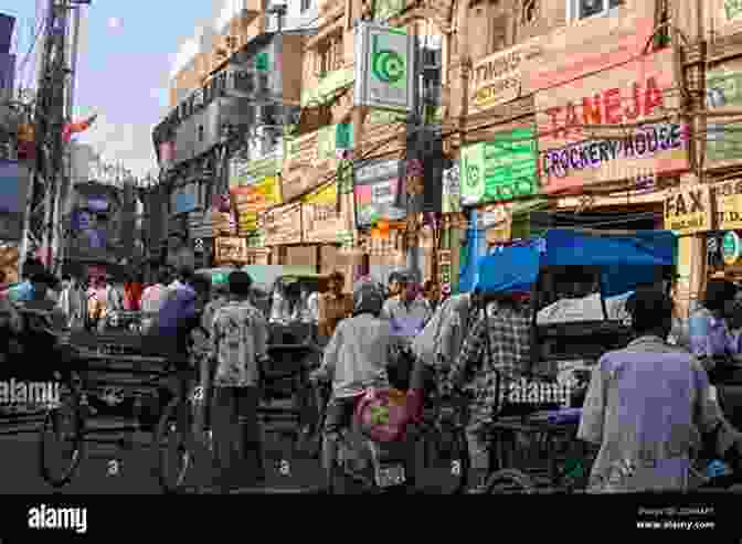 A Bustling Street In India, Filled With Colorful Shops And People Photos Taken By Japanese Tourist In India