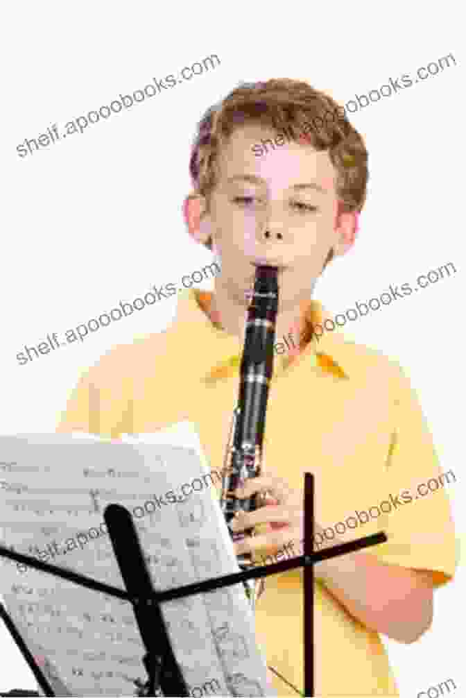 A Young Student Playing The Clarinet Student Instrumental Course: Clarinet Student Level 3