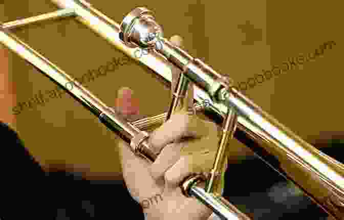 Close Up Of A Trombone Player's Hands On Valves Belwin Master Solos Trombone Intermediate Volume 1: Trombone Solos