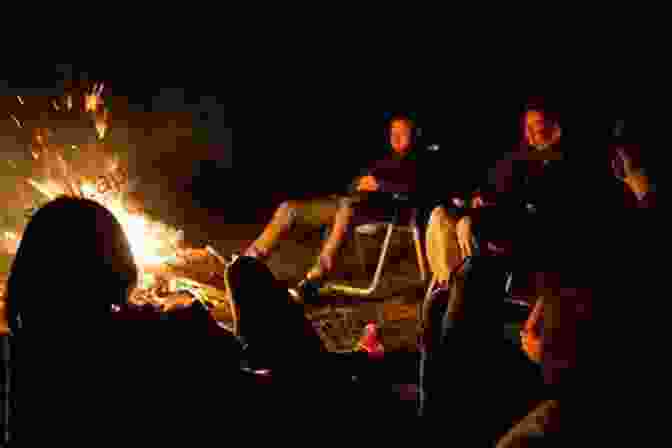 Families And Friends Gathered Around A Campfire On The Shores Of Preveli Lagoon, Enjoying The Warm Evening Atmosphere Preveli Lagoon Photo Gallery Dmitriy Ganich