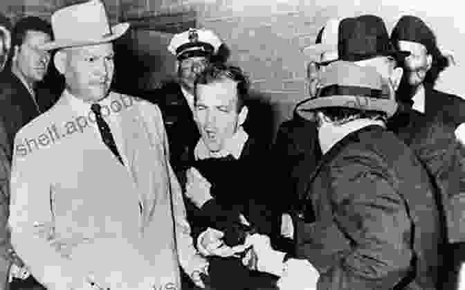 Lee Harvey Oswald, A Young Man With A Serious Expression, Wearing A Suit And Tie Lee Harvey Oswald S Speech At Spring Hill College: A Report