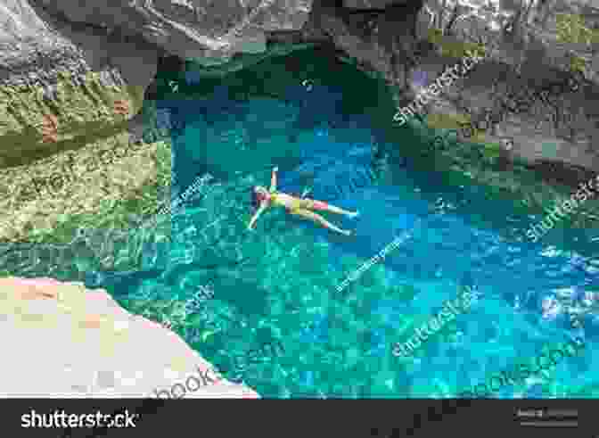 People Enjoying A Refreshing Swim In The Crystal Clear Waters Of Preveli Lagoon Preveli Lagoon Photo Gallery Dmitriy Ganich